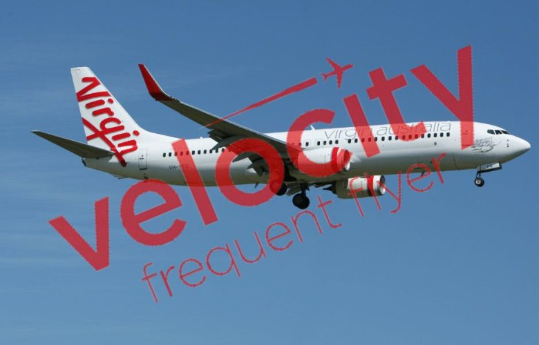 Virgin Australia plane in the sky with Velocity watermark