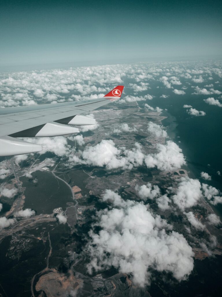 Ariel image of turkish airlines wing amongst the clouds.