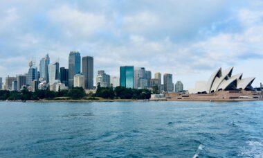 Sydney Opera House and Sydney skyline along the harbour.