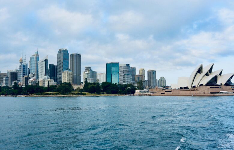 Sydney Opera House and Sydney skyline along the harbour.