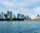 Sydney Opera House and Sydney skyline along the harbour.